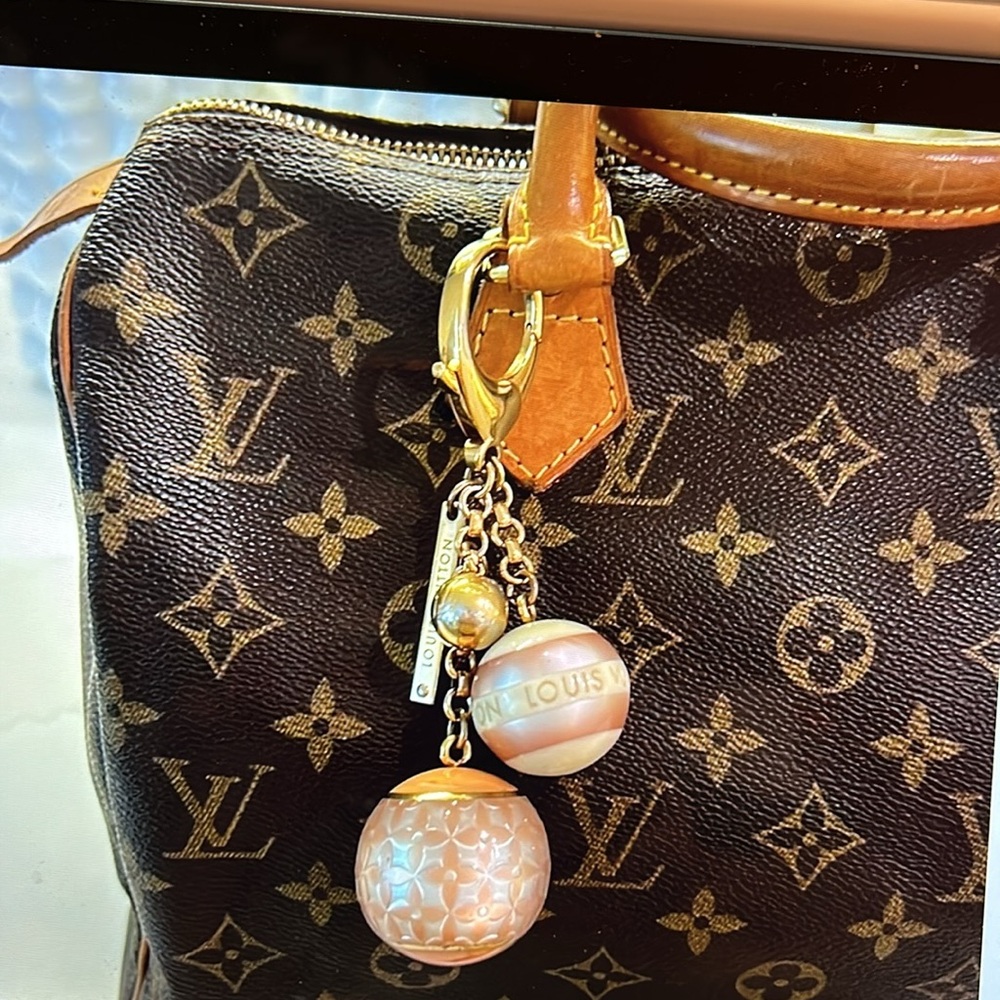 Louis Vuitton Gold and Pink Charm Keychain in Orange pull box